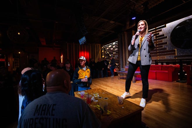 Iowa athletic director Beth Goetz speaks to Iowa wrestling fans during a Hawkeye Huddle ahead of the NCAA championships semifinal round Friday, March 22, 2024, at the Power and Light District in Kansas City, MO.