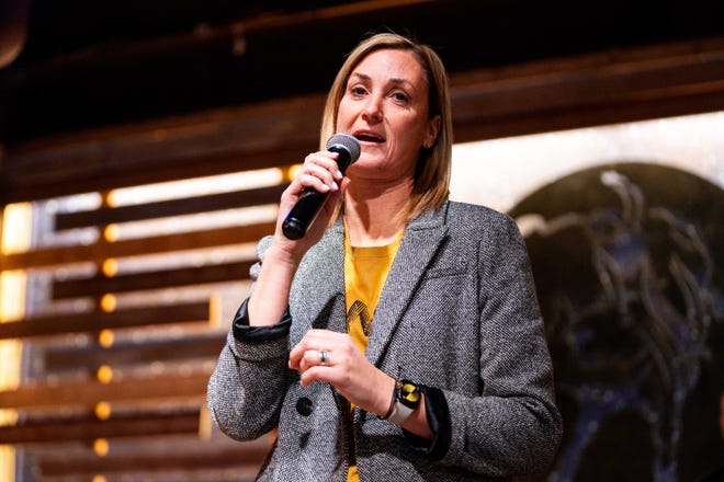 Iowa athletic director Beth Goetz speaks to Iowa wrestling fans during a Hawkeye Huddle ahead of the NCAA championships semifinal round Friday, March 22, 2024, at the Power and Light District in Kansas City, MO.