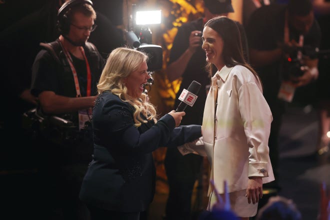Apr 15, 2024; Brooklyn, NY, USA; ESPN reporter Holly Rowe interviews Caitlin Clark after she is selected with the number one overall pick to the Indiana Fever in the 2024 WNBA Draft at Brooklyn Academy of Music. Mandatory Credit: Brad Penner-USA TODAY Sports