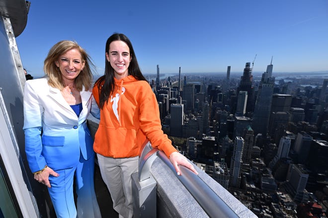 NEW YORK, NEW YORK - APRIL 15: (L-R) Cathy Engelbert and Caitlin Clark at The Empire State Building on April 15, 2024 in New York City. (Photo by Roy Rochlin/Getty Images for Empire State Realty Trust)
