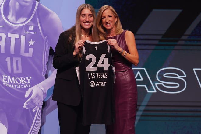 Apr 15, 2024; Brooklyn, NY, USA; Kate Martin poses with WNBA commissioner Cathy Engelbert after being selected with the number eighteen overall pick to the Las Vegas Aces in the 2024 WNBA Draft at Brooklyn Academy of Music. Mandatory Credit: Brad Penner-USA TODAY Sports