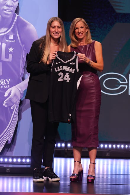Apr 15, 2024; Brooklyn, NY, USA; Kate Martin poses with WNBA commissioner Cathy Engelbert after being selected with the number eighteen overall pick to the Las Vegas Aces in the 2024 WNBA Draft at Brooklyn Academy of Music. Mandatory Credit: Brad Penner-USA TODAY Sports