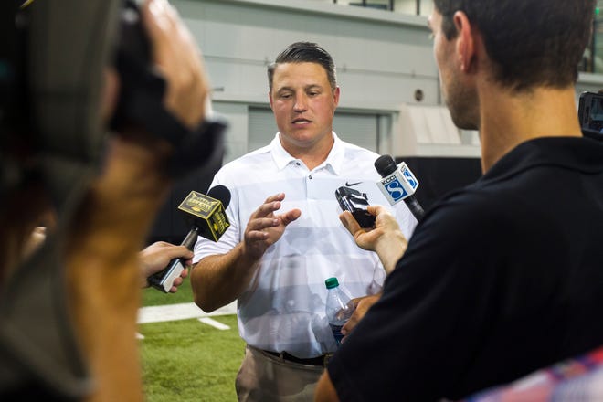 Iowa offensive coordinator Brian Ferentz talks with reporters during Iowa football media day on Friday, Aug. 10, 2018, in Iowa City.