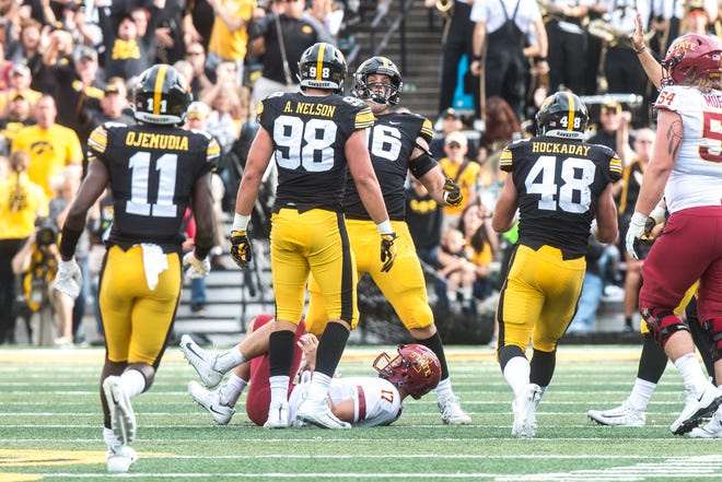Iowa defensive end Matt Nelson (96) celebrates after sacking Iowa State quarterback Kyle Kempt (17) during the Cy-Hawk NCAA football game on Saturday, Sept. 8, 2018, at Kinnick Stadium in Iowa City.
