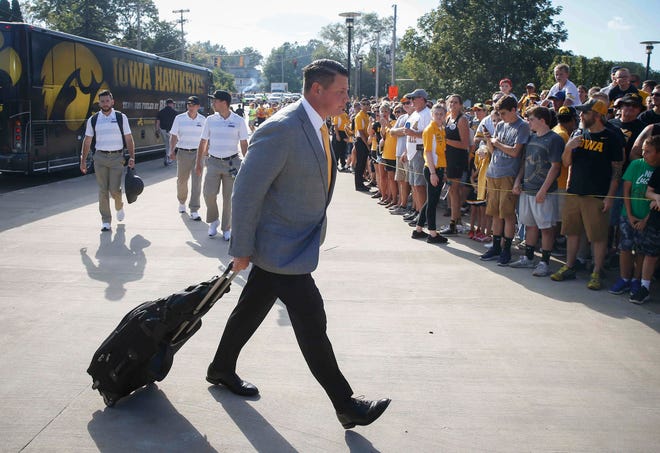 Iowa offensive coordinator Brian Ferentz steps off the bus and makes his way to the stadium prior to kickoff against Northern Iowa on Saturday, Sept. 15, 2018, at Kinnick Stadium in Iowa City.