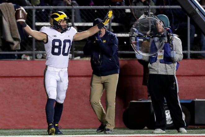 Michigan receiver Oliver Martin celebrates his touchdown during the second half against Rutgers, Saturday, Nov. 10, 2018, in Piscataway, N.J.