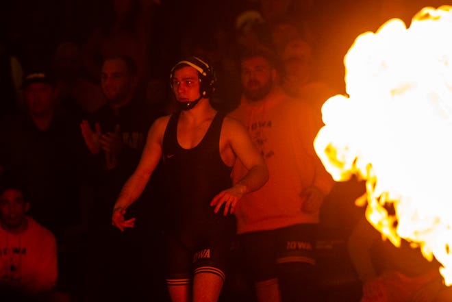 Iowa's Spencer Lee is introduced before his match at 125 during a NCAA Cy-Hawk series wrestling dual on Saturday, Dec. 1, 2018, at Carver-Hawkeye Arena in Iowa City.