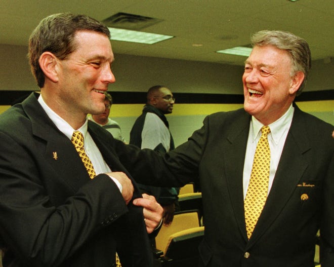 From 1998: Retired Iowa football coach Hayden Fry, right, was on hand to welcome his former assistant, Kirk Ferentz, as his successor with the Hawkeyes. Ferentz served as Iowa's offensive line coach under Fry from 1981 to 1989.