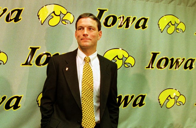 From 1998: Kirk Ferentz surveys the crowd after being introduced as Iowa's new football coach during a news conference Thursday evening, Dec. 3, 1998, in Iowa City. Ferentz, then an assistant coach for the Baltimore Ravens, replaced Hayden Fry who retired after coaching Iowa for the past 20 years.