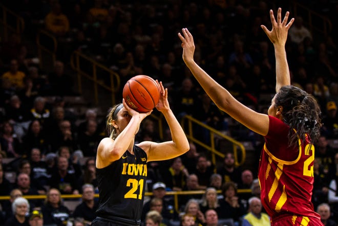 Iowa forward Hannah Stewart (21) attempts a basket during a Cy-Hawk series NCAA women's basketball game on Wednesday, Dec. 5, 2018, at Carver-Hawkeye Arena in Iowa City.
