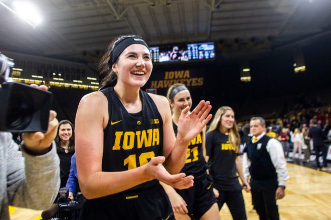 Iowa forward Megan Gustafson (10) claps after a Cy-Hawk series NCAA women's basketball game on Wednesday, Dec. 5, 2018, at Carver-Hawkeye Arena in Iowa City. The Hawkeyes defeated the Cyclones, 73-70.