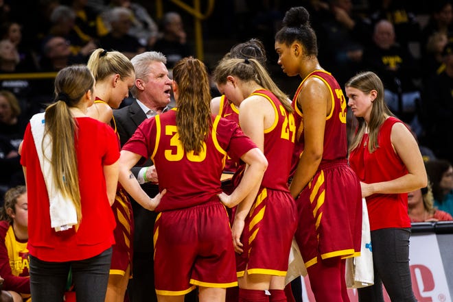 Iowa State head coach Bill Fennelly talks with players in a timeout during a Cy-Hawk series NCAA women's basketball game on Wednesday, Dec. 5, 2018, at Carver-Hawkeye Arena in Iowa City.