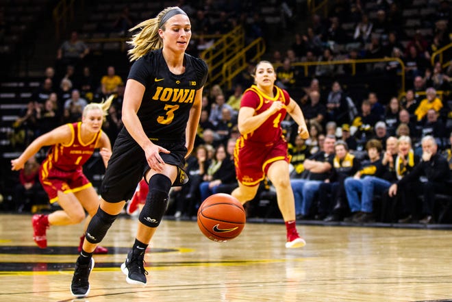 Iowa guard Makenzie Meyer (3) drives to the basket after getting a steal during a Cy-Hawk series NCAA women's basketball game on Wednesday, Dec. 5, 2018, at Carver-Hawkeye Arena in Iowa City.