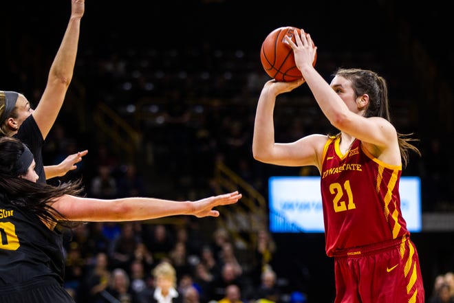 Iowa State guard Bridget Carleton (21) attempts a basket during a Cy-Hawk series NCAA women's basketball game on Wednesday, Dec. 5, 2018, at Carver-Hawkeye Arena in Iowa City.