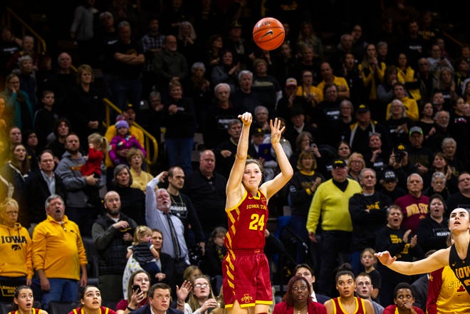 Iowa State guard Ashley Joens (24) attempts a 3-point basket at the buzzer during a Cy-Hawk series NCAA women's basketball game on Wednesday, Dec. 5, 2018, at Carver-Hawkeye Arena in Iowa City.