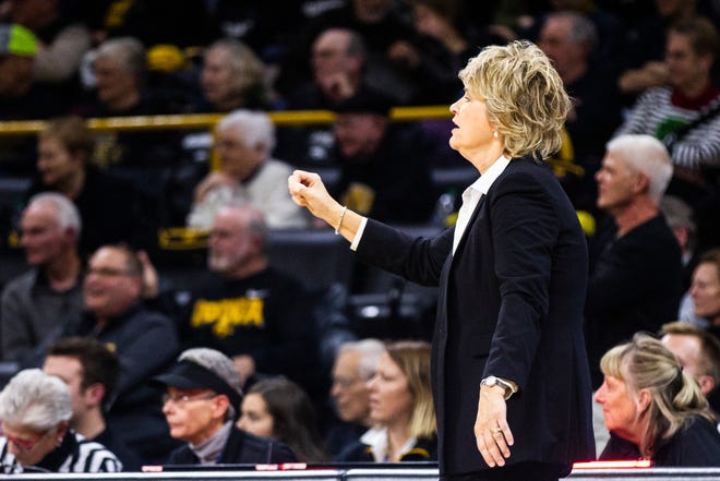 Iowa head coach Lisa Bluder calls out to players during a Cy-Hawk series NCAA women's basketball game on Wednesday, Dec. 5, 2018, at Carver-Hawkeye Arena in Iowa City.
