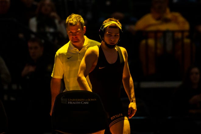 Iowa's Spencer Lee is introduced during a NCAA wrestling dual on Saturday, Dec. 8, 2018, at Carver-Hawkeye Arena in Iowa City.