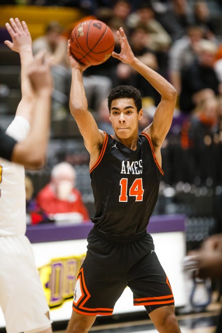 Ames freshman Tamin Lipsey looks for a pass during Ames' basketball game against Johnston on Friday, Jan. 11, 2019, in Johnston.