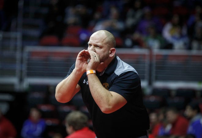 Denver head wrestling coach Chris Krueger calls out to a wrestler in a state dual against Don Bosco during the 2019 Iowa high school dual wrestling state tournament on Wednesday, Feb. 13, 2019, at Wells Fargo Arena in Des Moines.