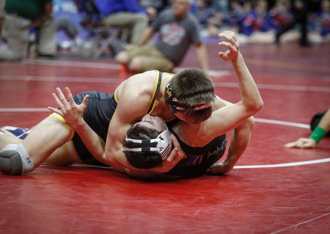 English Valley's senior Cooper Andreassen scores back points on North Linn senior Brady Henderson in their match at 152 pounds during the opening round of Class 1A matches during the Iowa high school state wrestling tournament at Wells Fargo Arena on Thursday, Feb. 14, 2019, in Des Moines.
