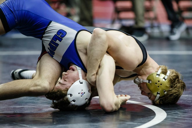 Cullan Schriever of Mason City wrestles Kael Scranton of Clear Creek-Amana during their 3A 120 lb match at the state wrestling tournament on Thursday, Feb. 14, 2019 in Des Moines.