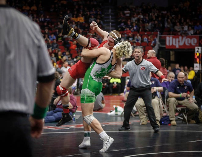 Southeast Warren senior Colby Page takes Alta-Aurelia sophomore Alex De Roos down to the mat in their match at 182 pounds during the opening round of Class 1A matches during the Iowa high school state wrestling tournament at Wells Fargo Arena on Thursday, Feb. 14, 2019, in Des Moines.