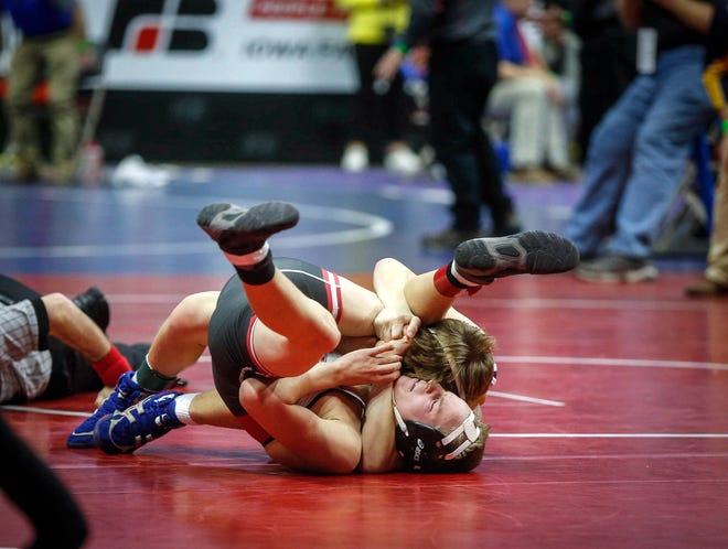 Oakland Riverside sophomore Mick Schroder pins North Mahaska freshman Michael Dejong in their match at 113 pounds during the opening round of Class 1A matches during the Iowa high school state wrestling tournament at Wells Fargo Arena on Thursday, Feb. 14, 2019, in Des Moines.