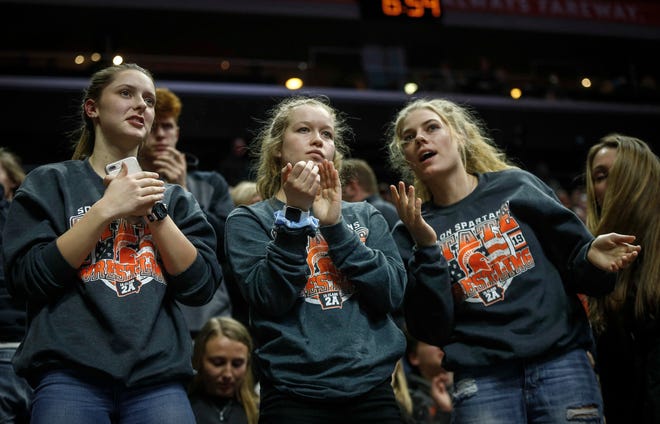 Solon fans cheer during the 2019 Iowa high school dual wrestling state tournament on Wednesday, Feb. 13, 2019, at Wells Fargo Arena in Des Moines.
