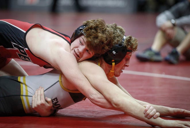 Pekin sophomore Cael Baker, top, controls Emmetsburg senior Spencer Griffin in their match at 145 pounds during the opening round of Class 1A matches during the Iowa high school state wrestling tournament at Wells Fargo Arena on Thursday, Feb. 14, 2019, in Des Moines.