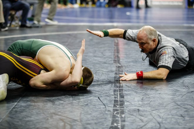 Same Kallem from Ankeny wrestles Joe Pins from Dubuque Hempstead during their 3A 132 lb match at the state wrestling tournament on Thursday, Feb. 14, 2019 in Des Moines.
