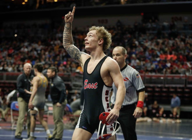 Des Moines East senior Matthew Jordan celebrates after beating Waverly-Shell Rock senior Dylan Albrecht at 126 pounds during the state wrestling quarterfinals on Friday, Feb. 15, 2019, at Wells Fargo Arena in Des Moines.