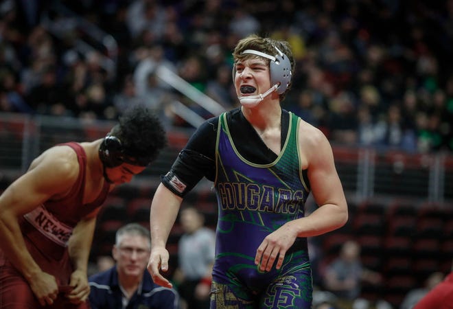 Sumner Fredericksburg junior Treyten Steffen comes back to center mat in his match against Mason City Newman Catholic senior Chase McCleish at 195 pounds during the state wrestling quarterfinals on Friday, Feb. 15, 2019, at Wells Fargo Arena in Des Moines.