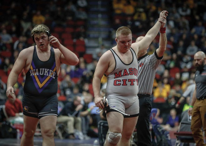 Mason City senior Troy Monahan beat Waukee junior Conner Arndt in overtime in their match at 285 pounds during the state wrestling quarterfinals on Friday, Feb. 15, 2019, at Wells Fargo Arena in Des Moines.
