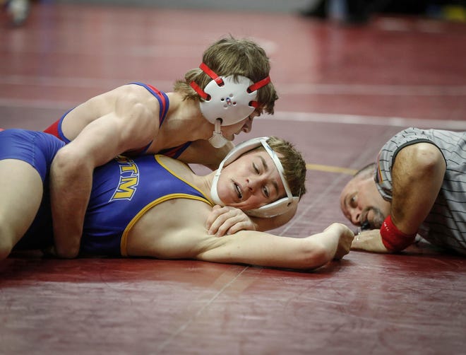 West Sioux-Hawarden junior Adam Allard pins Martensdale-St. Mary's sophomore Cael Cassady in their match at 120 pounds during the state wrestling quarterfinals on Friday, Feb. 15, 2019, at Wells Fargo Arena in Des Moines.
