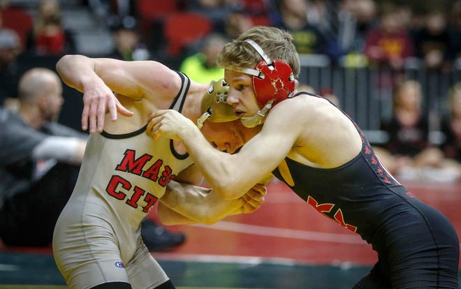 Iowa City High's Ethan Wood-Finley, right, battles Mason City's Jace Rhodes in their match at 106 pounds during the state wrestling quarterfinals on Friday, Feb. 15, 2019, at Wells Fargo Arena in Des Moines.