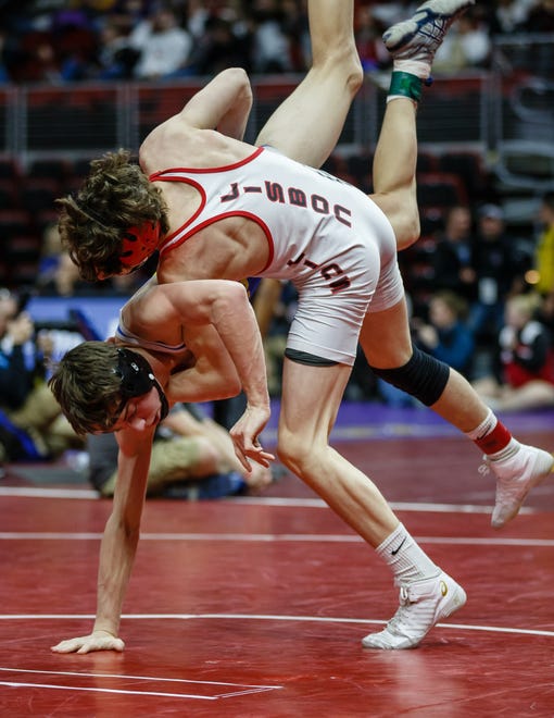 Cobe Siebrecht of Lisbon wrestles Cael Frost of Don Bosco during their class 1A 138 pound state championship semi-final match on Friday, Feb. 15, 2019 in Des Moines. Siebrecht moves onto the finals with a 6-2 decision.