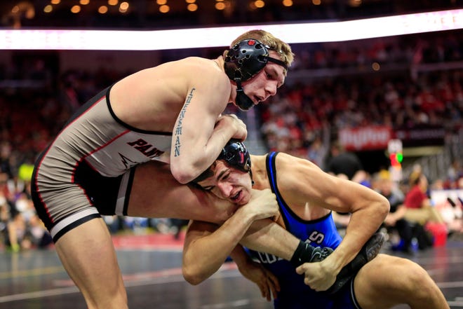 Will Esmoil of West Liberty defeats Chase Luensman of Monticello during a 145 Lb 2A quarterfinal match at the state wrestling tournament Friday, Feb. 15, 2019.