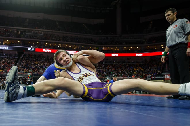 Briar Reisz of Logan-Magnolia wrestles Cole Cassady of Martensdale, St. Mary's during their class 1A 126 pound state championship semi-final match on Friday, Feb. 15, 2019 in Des Moines. Reisz moves onto the final with a 3-1 decision.