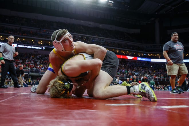Mason Griffin of Emmetsburg wrestles Carson Tenold of Don Bosco during their class 1A 160 pound state championship semi-final match on Friday, Feb. 15, 2019 in Des Moines. Tenold moves onto the finals with a 10-5 decision.