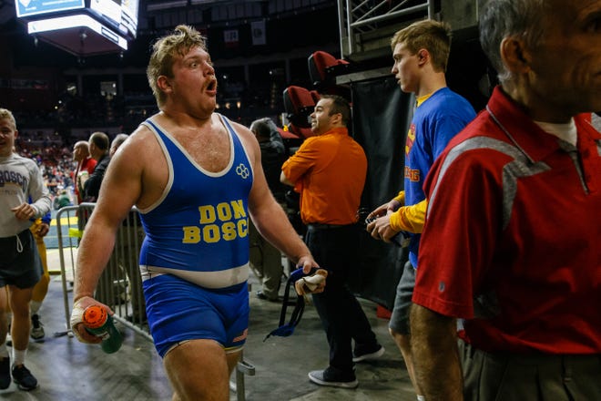 Noah Pittman of Don Bosco reacts after defeating Chandler Redenius of West Hancock during their class 1A 285 pound state championship semi-final match on Friday, Feb. 15, 2019 in Des Moines. Pittman advances to the finals.