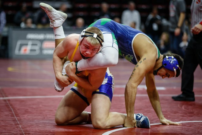 Tucker Kroeze of Belmond-Klemme wrestles Thomas Even of Don Bosco during their class 1A 182 pound state championship semi-final match on Friday, Feb. 15, 2019 in Des Moines. Even moves onto the final with a fall.