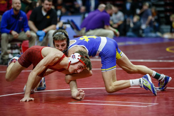Casey Baker of Interstate 35 wrestles Daniel Kimball of Don Bosco during their class 1A 120 pound state championship semi-final match on Friday, Feb. 15, 2019 in Des Moines. Kimball goes onto the finals with tech fall.