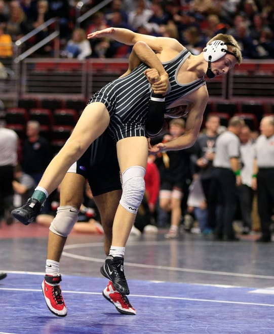 Eric Owens of Ankeny Centennial defeats Deville Dentis of Des Moines East during a 145 Lb 3A semifinal match at the state wrestling tournament Friday, Feb. 15, 2019.