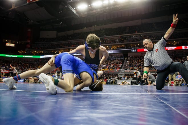 Stevie Barnes of Underwood wrestles Clayton McDonough of Central Springs during their class 1A 106 pound state championship semi-final match on Friday, Feb. 15, 2019 in Des Moines. Barnes advances to the finals with a 4-2 sudden victory.