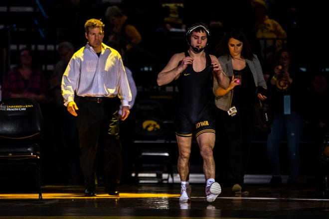 Iowa's Spencer Lee is introduced before a match against Indiana at 125 during a NCAA Big Ten Conference wrestling dual on Friday, Feb. 15, 2019 at Carver-Hawkeye Arena in Iowa City, Iowa.