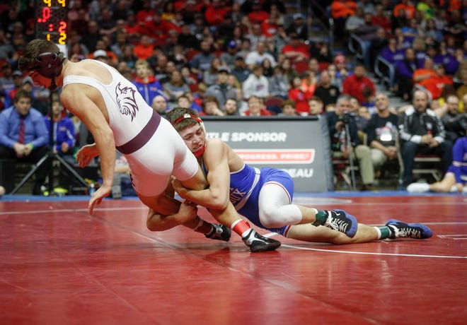 West Sioux senior Kory Van Oort scores a takedown on North Linn senior Brady Henderson in their match at 152 pounds during the state wrestling Class 1A championship on Saturday, Feb. 16, 2019, at Wells Fargo Arena in Des Moines.