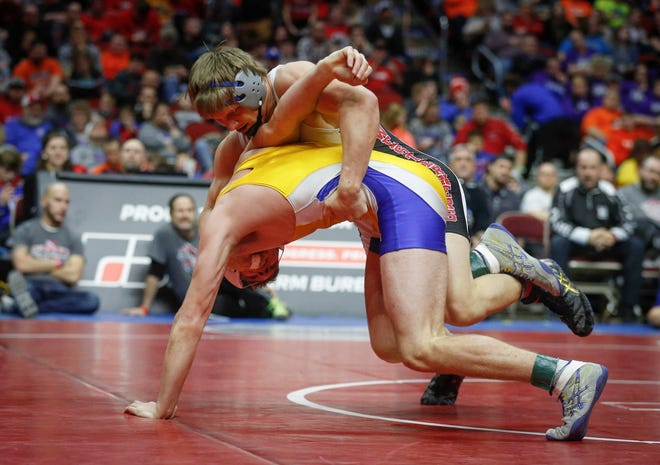 Akron-Westfield senior John Henrich takes Don Bosco freshman Carson Tenold to his shoulders in their match at 160 pounds during the state wrestling Class 1A championship on Saturday, Feb. 16, 2019, at Wells Fargo Arena in Des Moines.
