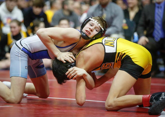 New London freshman Marcel Lopez, right, ties up with Underwood's Stevie Barnes in their match art 106 pounds during the state wrestling Class 1A championship on Saturday, Feb. 16, 2019, at Wells Fargo Arena in Des Moines.