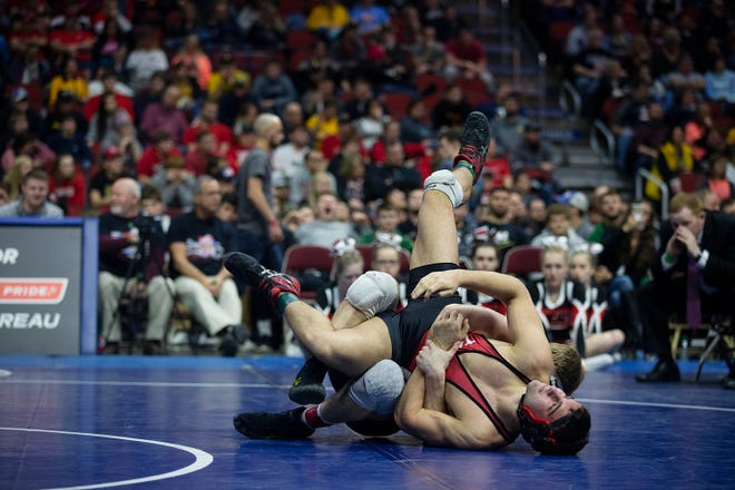 Linn-Mar's Jacob Wempen wrestles Western Dubuque's Devin Ludwig during the 182 pound class 3A championship match during the Iowa high school state wrestling tournament on Saturday, Feb. 16, 2019, in Wells Fargo Arena.