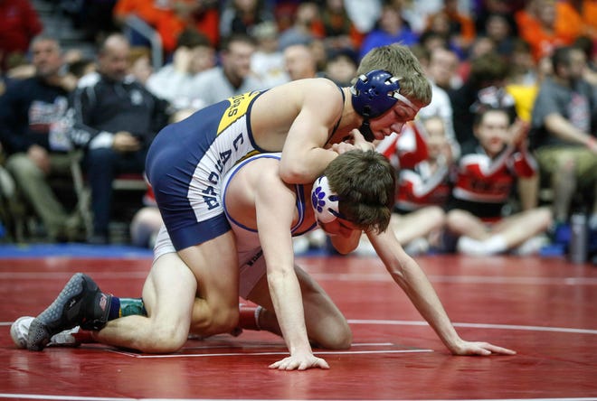 Cascade sophomore Aidan Noonan controls Woodbury Central's Beau Klingensmith in their match at 113 pounds during the state wrestling Class 1A championship on Saturday, Feb. 16, 2019, at Wells Fargo Arena in Des Moines.